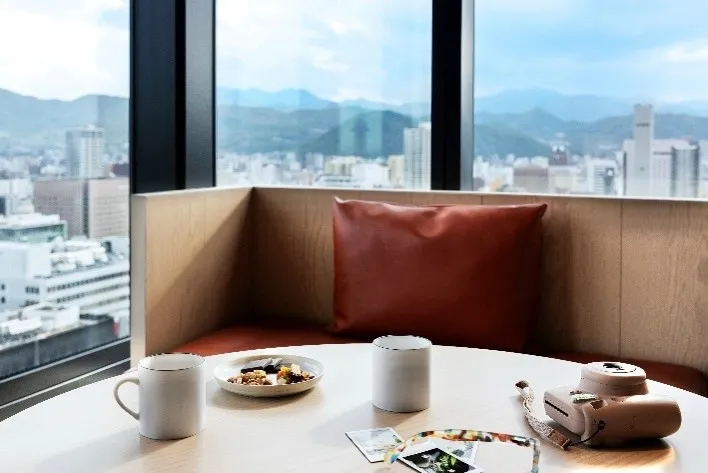 Views of Sapporo city unfolding from the guest room window.